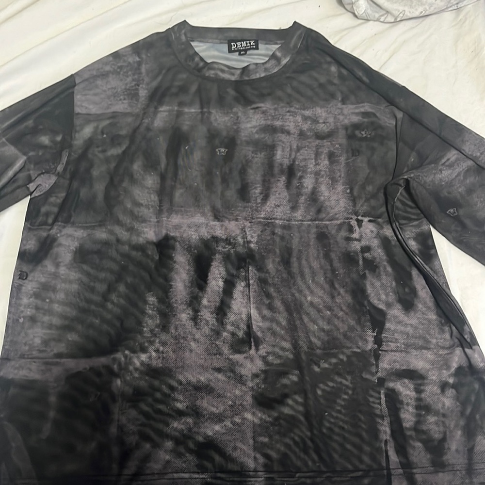demik exclusive y2k mesh shirt.